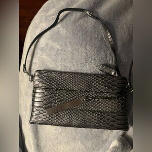 Wristlet/shoulder bag by Devin Kroell